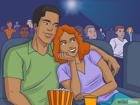 Step 1 Put your arm around her while you're sitting next to her.